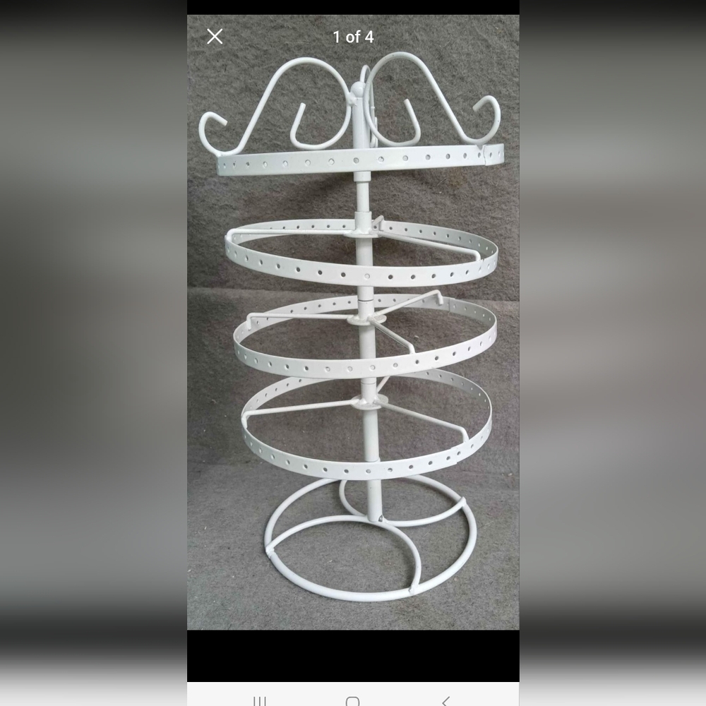 Earring spinning holder.  Holds about 100 pairs.